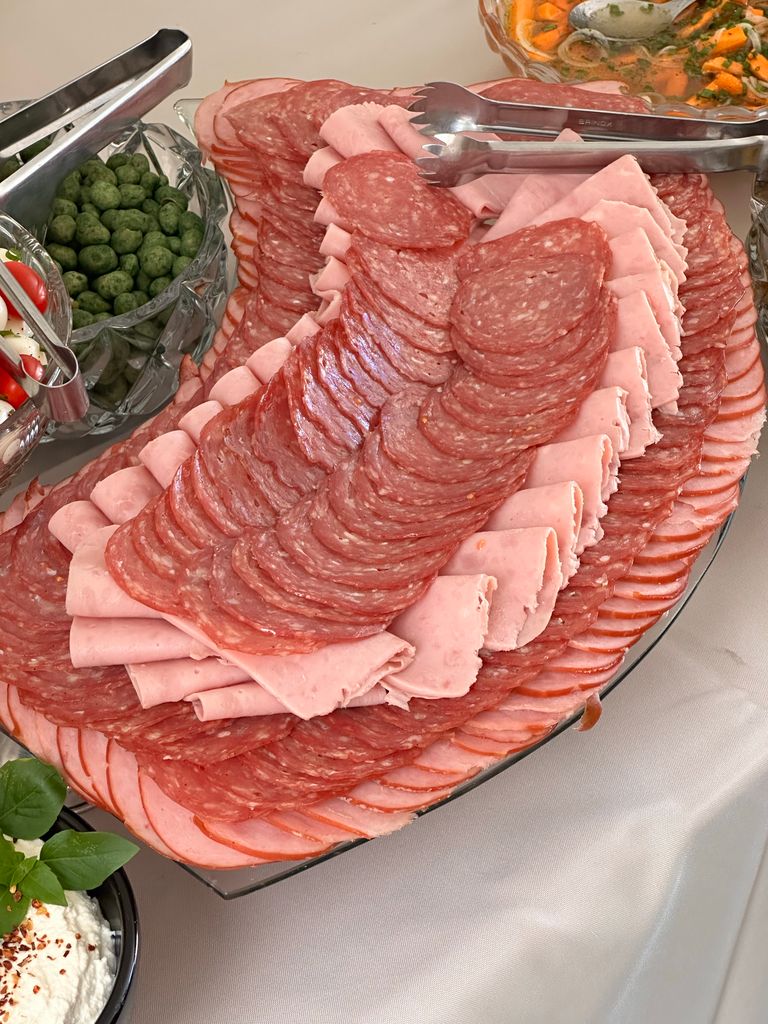 A tempting display of assorted sliced meat, perfect for buffets.